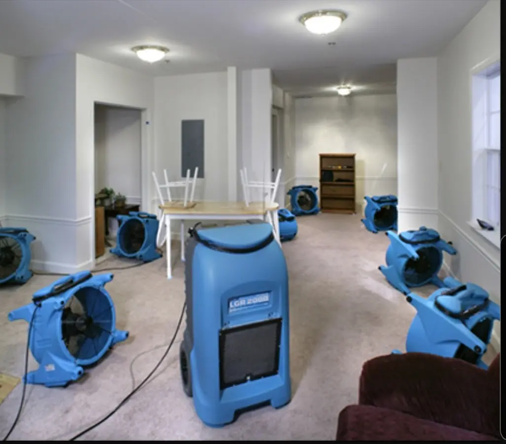 Air movers and dehumidifier setup for Water Damage Restoration in Wright City